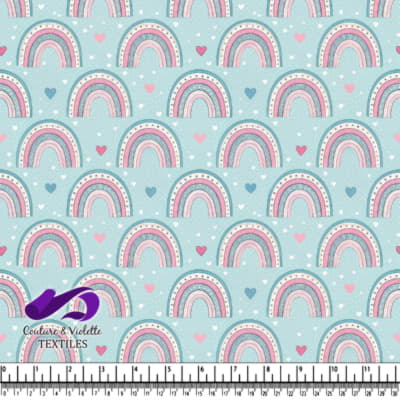 Pastel Rainbow Hearts Pattern on Blue Background Textile Design