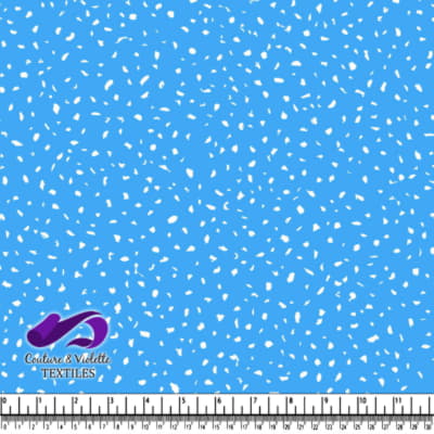 Blue fabric with scattered small white shapes