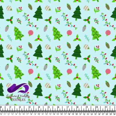 Light blue background with various green Christmas trees