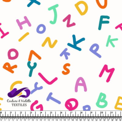 Colorful scattered alphabet letters pattern on white background