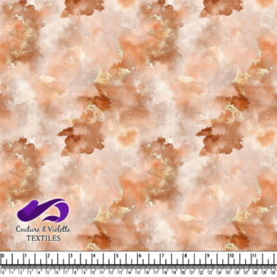 Soft watercolor texture in warm beige with subtle gold accents