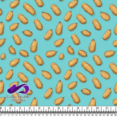 Peanut pattern on blue background with ruler for scale